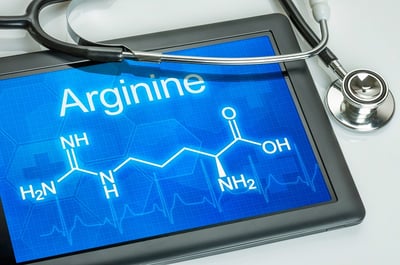 Tablet mit der chemischen Formel von Arginin